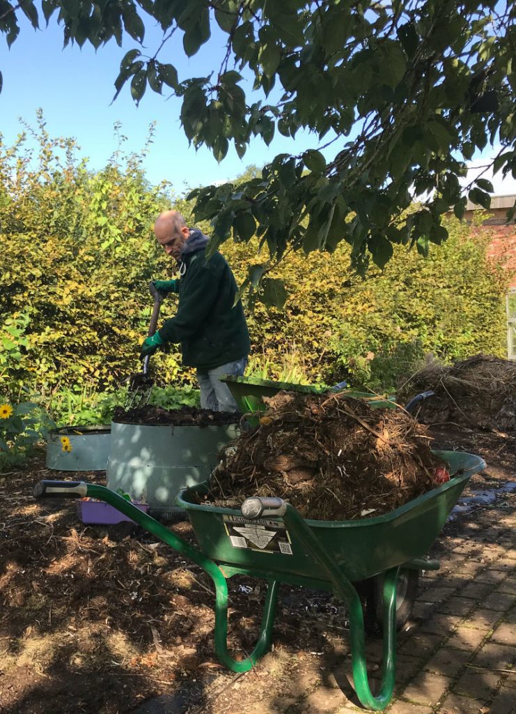 Spreading compost as a mulch